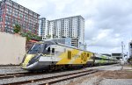 Charger # 118 pushes the Brightline consist into WPB Depot 